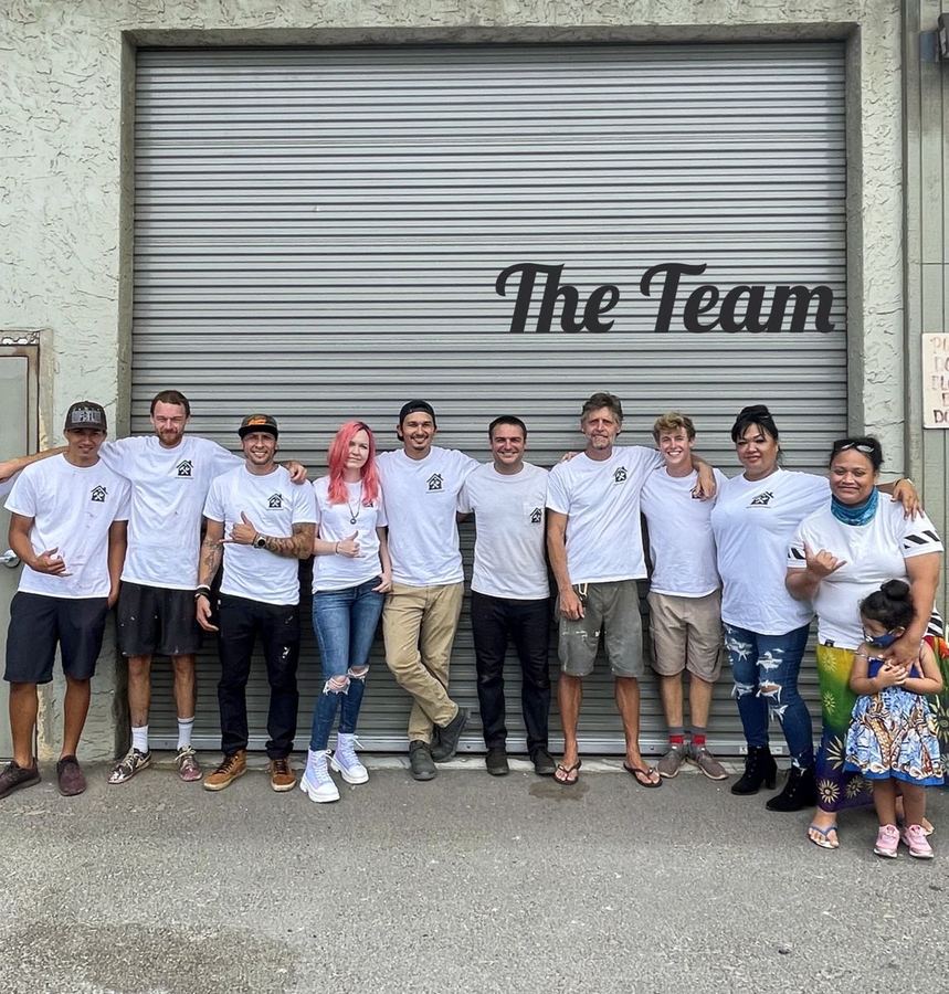 The Hawaiʻi Handyman team standing together in matching shirts